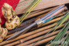 Bark River Knives: Kitsune Tanto - CPM 154 - Brass Bolster - White Texas Fencepost - Blue Liners