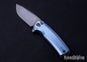 Zero Tolerance: 0044BLU Flipper - Factory Special Series - Blue Anodized Titanium - CPM-S90V - Working Finish - Button Lock