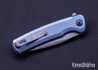 Zero Tolerance: 0044BLU Flipper - Factory Special Series - Blue Anodized Titanium - CPM-S90V - Working Finish - Button Lock