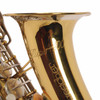 Close-up of the Buescher Super 400 bell engraving and polished gold finish. card