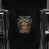 Close-up of Ludwig Chicago USA keystone badge and serial number 3113272 on black snare drum shell. card