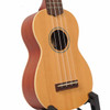 Front angled view of the Stagg US60-S soprano ukulele highlighting the natural top, body depth, and side profile.