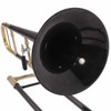 Close-up looking into the black carbon fiber trombone bell with the slide and brass tubing visible behind it. card