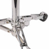 Close-up of Pearl snare stand tripod base, folding braces, and chrome center tube. card