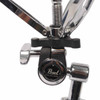 Close-up of Pearl Gyro-Lock snare stand tilter with adjustment knobs and chrome hardware. card
