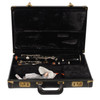 Open Selmer hard case containing the disassembled used Series 9 Bb clarinet and included accessories. card
