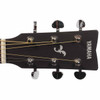Close-up of the Yamaha FS800J headstock showing the logo, nut, strings, and chrome tuning machines. card