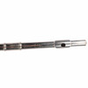 Close-up of Gemeinhardt flute headjoint and embouchure hole showing surface scratches and wear in the silver finish. card