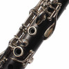 Detailed close-up of the Yamaha 450N upper joint showing the tone holes, wood grain, and wear on silver-plated keys. card