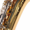 Close-up of light surface scratches on the body of the Yamaha YAS-200ADII Advantage alto saxophone. card
