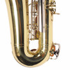 Close-up of the Yamaha YAS-23 alto saxophone lower bow showing the serial number and body details. card