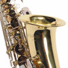 Close-up of the Yamaha YAS-23 alto saxophone bell showing the Yamaha logo and gold lacquer finish. card