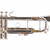 Close-up of the bell tail, valve slides, and third valve slide ring showing light finish wear and tarnish. card
