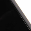 Close-up of black Ibanez Destroyer bass body edge showing small finish chips, dents, and surface wear. card