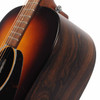 Close-up of the upper body on the used Martin DX-2 acoustic-electric guitar showing the sunburst finish and wood-grain side. card