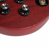 Close-up of finish wear and a small chip along the lower edge of the 2010 Epiphone SG G-400 Worn Cherry electric guitar body.