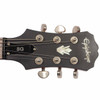 Close-up front view of the 2010 Epiphone SG G-400 headstock showing the Epiphone logo, SG truss rod cover, and tuning machines.