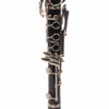 Close-up of the upper joint on used Bundy Resonite Bb clarinet highlighting the Bundy logo and nickel-plated keywork. card