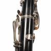 Close-up of the used Bundy Resonite Bb clarinet showing the engraved serial number S201646 on the upper body. card