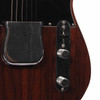 Close-up of the Fender Telecaster control plate with volume and tone knobs, selector switch, and chrome pickup cover. card