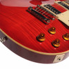 Close-up of the lower body showing the bridge, control knobs, output jack, and flamed maple top on the Epiphone Les Paul Standard Pro. card