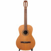 Full front view of the La Patrie Etude classical guitar with a natural finish on a guitar stand. card