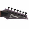 Close-up of the Ibanez RGA742EX reverse headstock showing the Ibanez logo, locking nut, and tuning machines. card