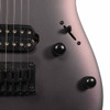 Close-up of the controls on the Ibanez RGA742EX showing the pickup selector switch, volume and tone knobs, and fixed bridge. card