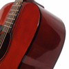 Close-up of the bass-side body on the Sawtooth ST-LH-AD-MV-CH acoustic guitar showing the cherry finish and wood grain.