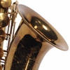 Close-up of the engraved bell on the used 1939 King Zephyr tenor saxophone.