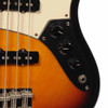 Close-up of the control plate with volume and tone knobs on the 2004 Fender Standard Jazz Bass in Brown Sunburst. card