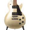 Front close-up of a used 2023 Gibson Les Paul Modern electric guitar in Light Gold Mist showing the body, dual humbuckers, bridge, and controls. card
