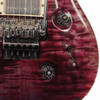 Close-up of the Floyd Rose tremolo, controls, and figured maple top on a 2014 PRS Custom 24 Floyd electric guitar. card