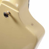 Close-up of the rear body showing scratches and a circular filled in screw hole for strap button on upper side. card