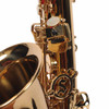 Close-up of Selmer Soloist alto saxophone side keywork and pads with light surface wear visible on the lacquer. card