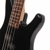 Close-up of the Yamaha TRBX204 body contour and lower fretboard in Galaxy Black. card