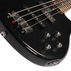 Close-up of the Yamaha TRBX204 bridge, output jack, pickups, and chrome control knobs. card