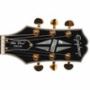 Close-up of the headstock on the used 2025 Epiphone Les Paul Custom featuring split-diamond inlay and gold tuning machines. card