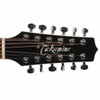 Close front view of the Takamine EF381SC headstock showing the Takamine logo, 12 strings, white binding, and chrome tuning hardware with light surface marks. card