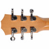 Rear close-up of Taylor acoustic guitar headstock showing chrome tuning machines and natural wood finish. card