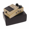 Angled view of BOSS RT-2 Rotary Ensemble pedal on its box showing footswitch, controls and side connection jacks. card