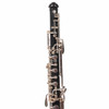 Upper-joint view of Selmer 1492B oboe showing black body, silver-colored keys, rods, and levers. card
