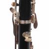Close-up of Selmer 1492B oboe body and keywork showing serial number area and tarnishing on metal components. card