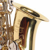 Close-up of Yamaha Advantage alto saxophone bell engraving with visible light surface scratches. card