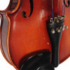 Close-up of violin lower body showing numerous scratches, finish chips, and a crack from the chinrest to the f-hole. card