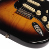 Close-up of the lower sunburst body showing the chrome tremolo bridge, pickups, controls, output jack, and light surface wear. card