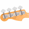 Rear headstock close-up showing Fender open-gear bass tuners, serial number, and Made in Ensenada marking. card