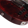 Angled close-up of the lower body showing the bridge, controls, output jack, strap button, and Wine Red finish. card