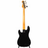 Full rear view showing the glossy black body, maple neck, and rear headstock. card
