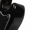 Detailed view of upper cutaway showing a horizontal scratch in the glossy black finish. card
